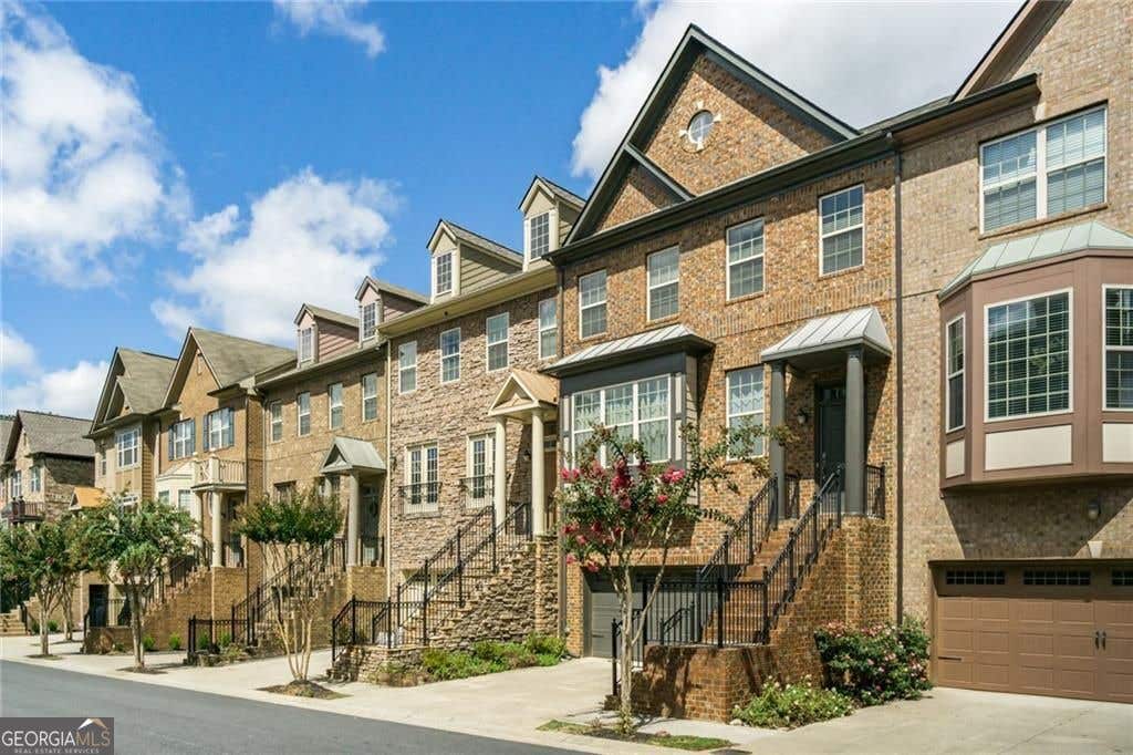 Photo of 9034 Woodland Trail, Alpharetta, GA 30009 (MLS # 10825687)