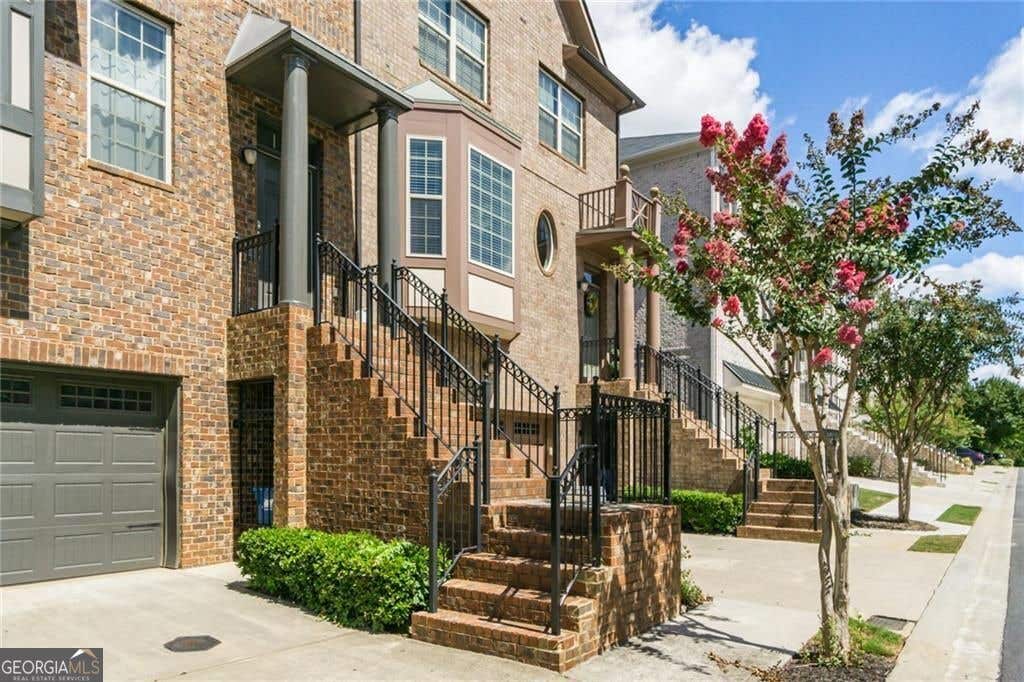 Photo of 9034 Woodland Trail, Alpharetta, GA 30009 (MLS # 10825687)