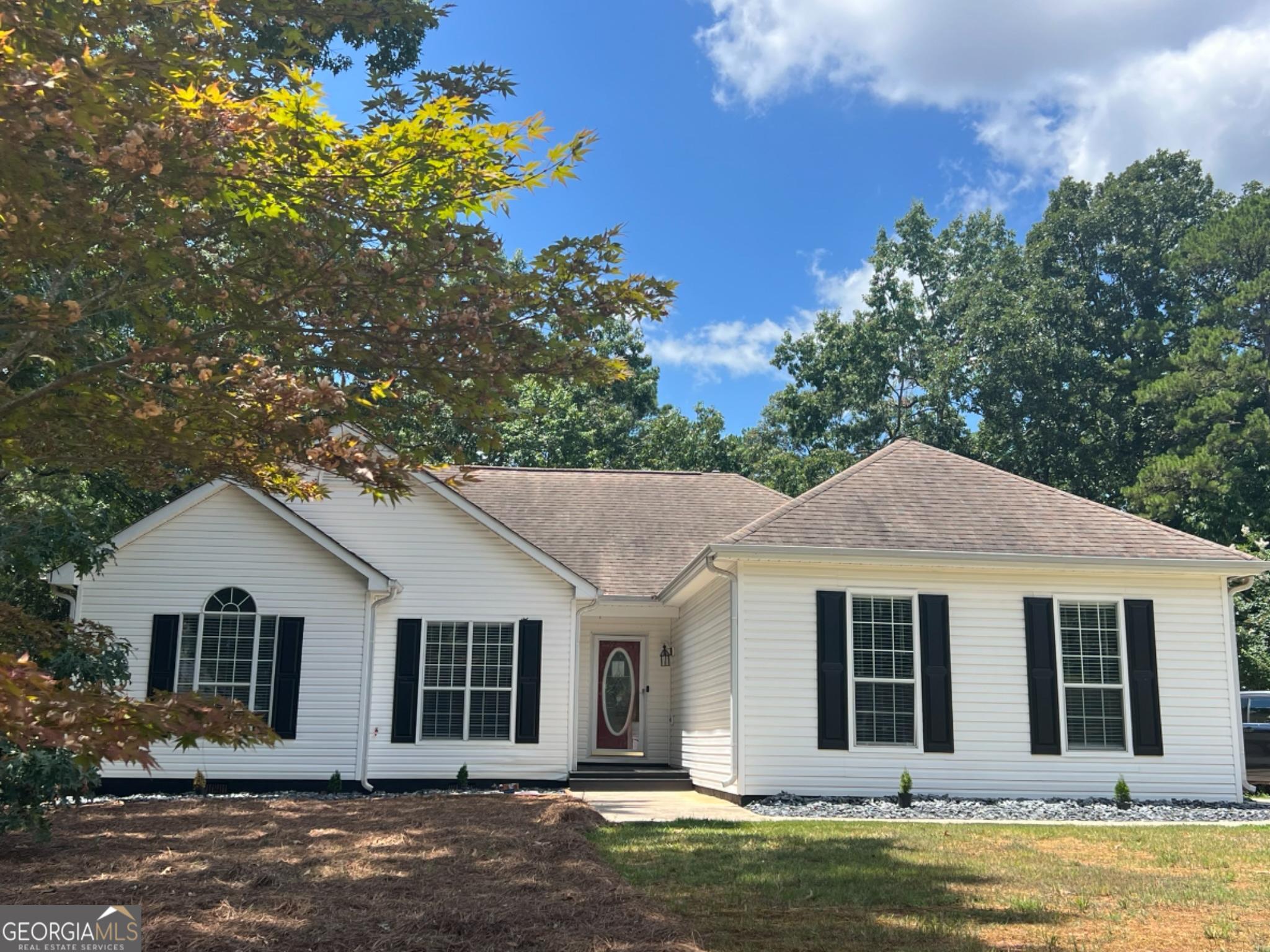 BIG PRICE REDUCTION!! MOTIVATED SELLER!! Bring an offer! Completely renovated ranch in a tranquil, peaceful setting but minutes away from highly sought after downtown Senoia! Fully move in ready! Lots of natural light! The vaulted great room with fireplace is open to the breakfast room and renovated kitchen - soft close drawers and cabinets with granite countertops, tile backsplash, and new stainless-steel appliances. New LVP throughout. The master suite is spacious with a trey ceiling; the master bath has large vanity, separate shower and garden tub. Generous secondary bedrooms. Screened porch with an extended deck perfect for entertaining overlooks a large, wooded yard. Equipped with a 240-volt fast charger outlet for an electric car. Just a golf cart ride away from historic downtown Senoia & the new Publix Shopping Center and in the Eastside / East Coweta School District. NO HOA! Qualifies for USDA financing. Don't miss out on this amazing opportunity to make this lovely ranch home your own!