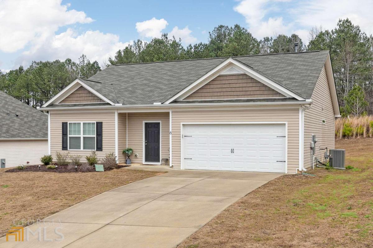 Cozy ranch in a quiet neighborhood. Wonderful 3 bedroom, 2 bath home located in Magnolia Walk subdivision. Kitchen looks over family room making it perfect for entertaining. Split bedroom plan for extra privacy. Covered back patio overlooks nice back yard. Large 2 car garage.