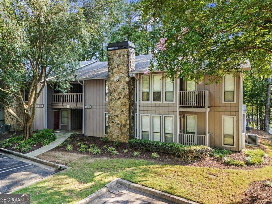 Beautifully updated move-in ready, ground-floor, one level home offering the perfect blend of style, comfort, and convenience! Featuring 2 spacious bedrooms and 2 full bathrooms, this updated condo is ideal for anyone seeking a roommate-friendly floor plan or low-maintenance living near the heart of Atlanta.  Step inside to find luxury vinyl plank flooring, freshly painted interiors, and an open-concept living area with a dining nook, office or sunroom space, and a cozy fireplace. The modern kitchen is a chef's dream with quartz countertops, stainless steel appliances, and a pantry with laundry room just steps away.  The primary suite offers a custom IKEA closet system, while both bedrooms feature professionally cleaned carpet. Updates include a brand-new hot water heater, a well-maintained HVAC system, and freshly updated finishes, ensuring peace of mind and a move-in ready experience.  Enjoy your morning coffee on the private covered porch overlooking green space, perfect for bird-watching and relaxing outdoors.  Community highlights include resort-style amenities designed for wellness and connection: a sparkling salt water swimming pool, pickleball courts, and beautifully landscaped grounds.  Located just minutes from downtown Tucker's Main Street, historic Norcross, Kelly Cofer Park, Embry Hills, Heritage Golf Links, and with easy access to I-85, I-285, and MARTA, this home offers unbeatable convenience for commuting and weekend adventures.  Don't miss the chance to own this Tucker condo with modern upgrades and amazing amenities - the perfect opportunity for first-time buyers, or down sizers! Agent is one of the owners.