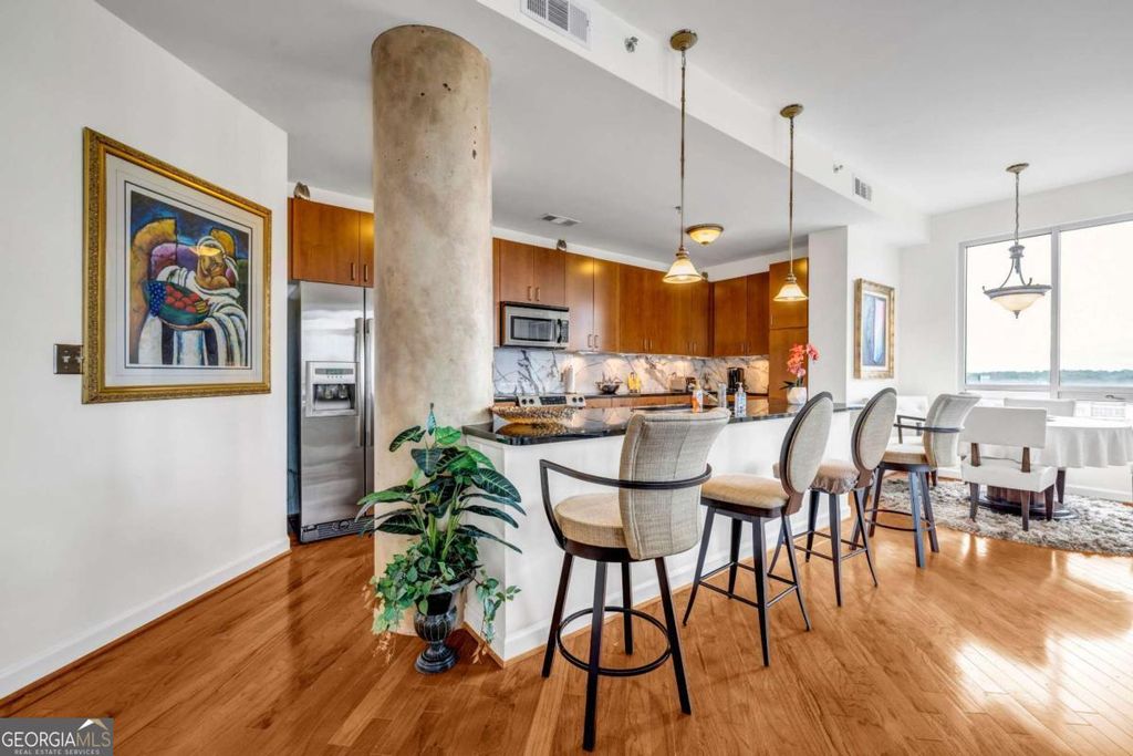 Photo of 711 Cosmopolitan Drive NE #707, Atlanta, GA 30324 (MLS # 10650640)