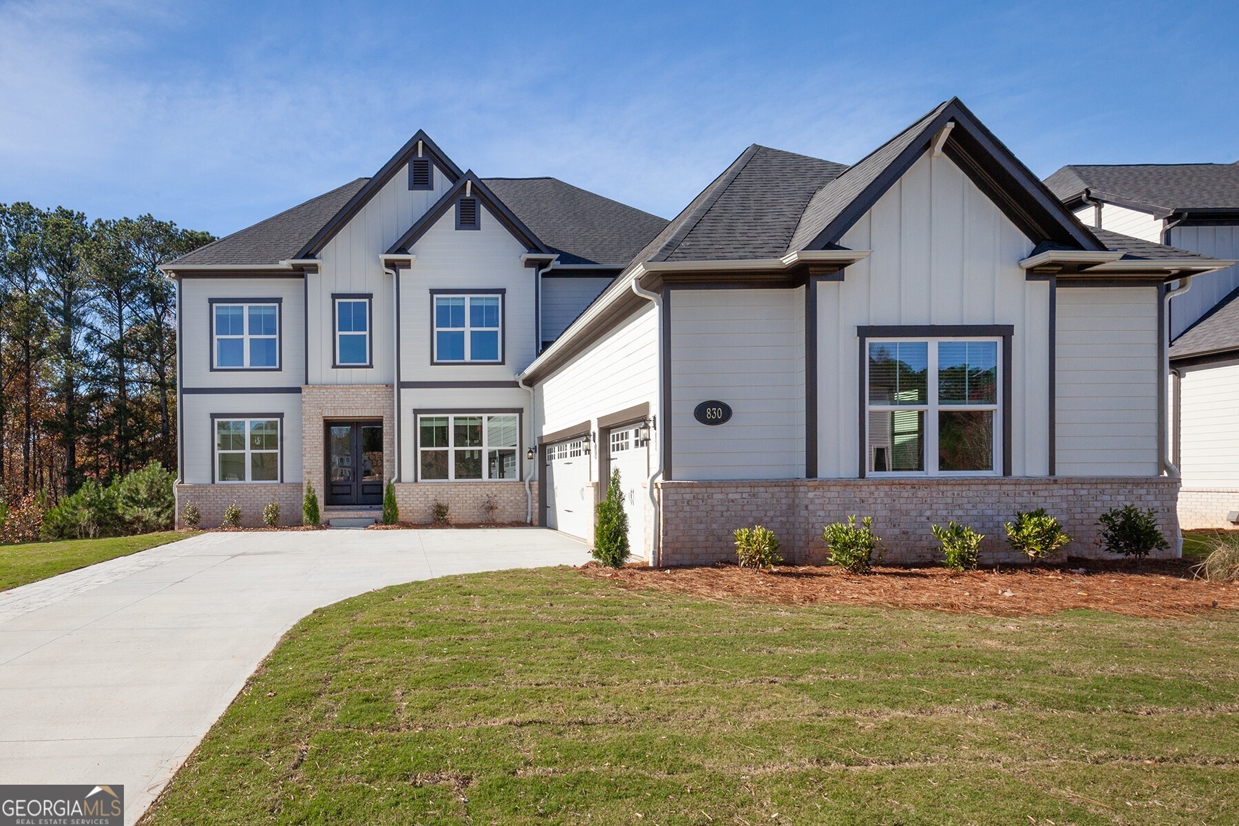 This Home is ready for the Holidays and a quick Move in! A quiet enclave of luxury homes in a GATED community, this NEW CONSTRUCTION home has it all! This cul-de-sac homesite has a beautiful level lot, sidewalks through out development, community lake, 4 side sodded yard that backs to a private wooded area. The main level features a two-story foyer, bright open floor plan, a gourmet kitchen w/ a huge island that opens to a spacious great room. The kitchen is light & bright with a walk-in pantry, hardwoods on the main and many upgrades. There is also a private guest bedroom on the main with its own full bath, Travel up the beautiful staircase to the loft and you will find a bonus area, the primary bedroom, laundry room and 3 additional bedrooms, don't forget the unfinished basement that's ready for your future design. This home is a true delight! You may never want to leave home. Conveniently located near award winning schools, restaurants, shopping, downtown Alpharetta, Avalon and the Halcyon mix-use development. Do not miss out on this unique opportunity. This home is in move-in ready condition.