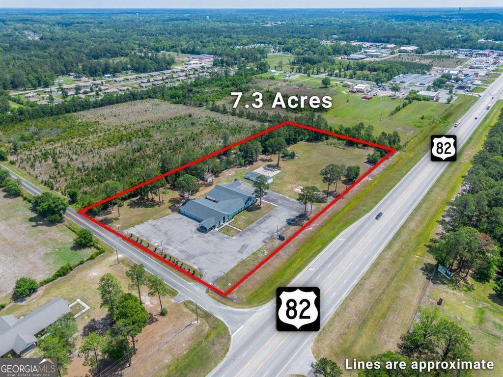 Photo of 128 University Boulevard, Waycross, GA 31503 (MLS # 10767788)