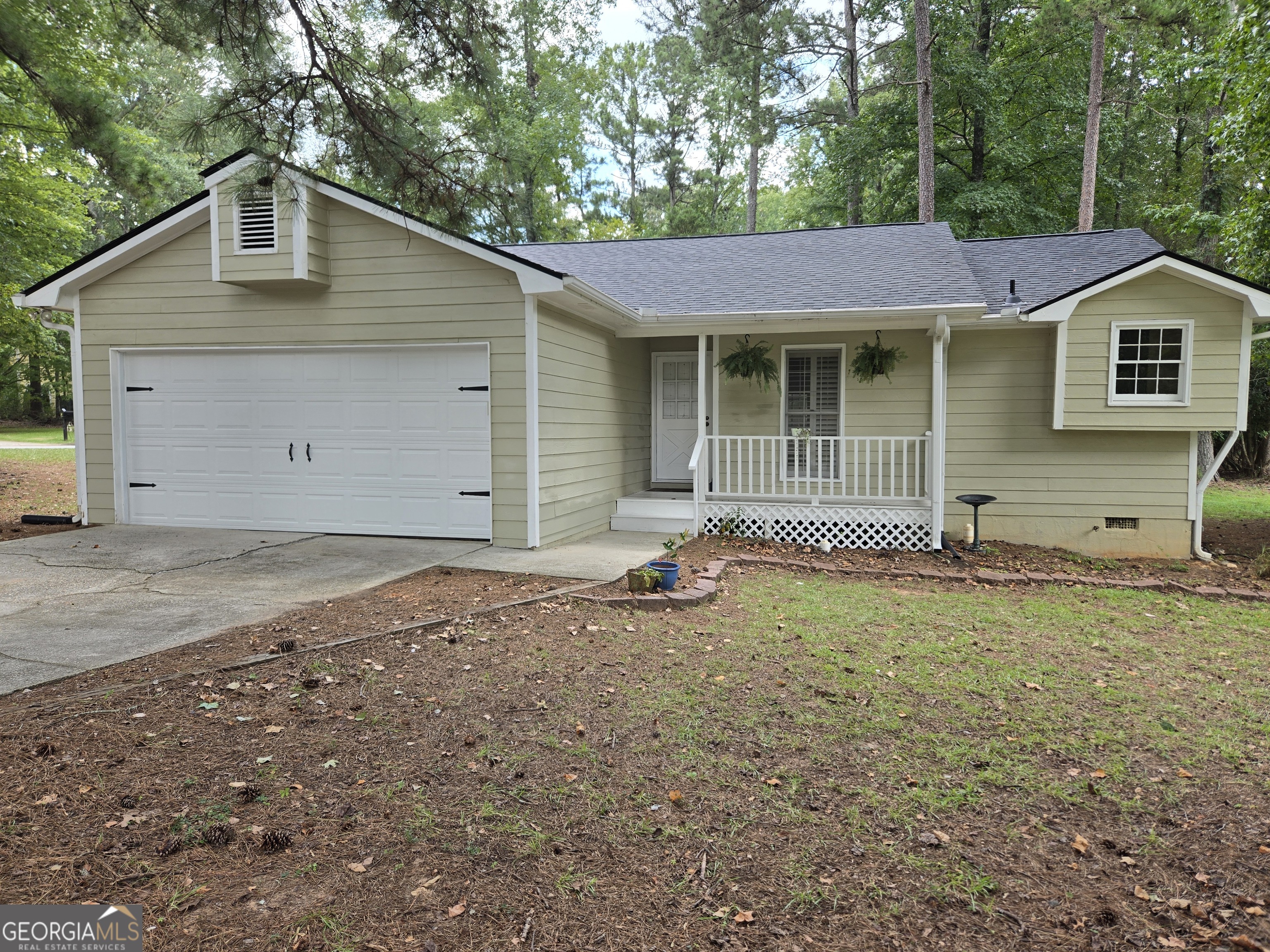 Back on market due to no fault of seller** Beautifully laid out ranch on a quiet street in lovely Peachtree City! This cozy 3 bed/2 bath home is located on the southside of Peachtree City in the highly desirable Starr's Mill high school district. Brand new roof! The kitchen boasts plenty of cabinet space, beautiful new quartz counters and a brand new dishwasher. Relax in the shade on your front porch or lounge out back in the spacious screened in patio overlooking the sizeable fenced in yard. Newer LVP flooring in all three bedrooms and living room, tile entry and kitchen. The large primary suite provides privacy apart from the two secondary bedrooms with a large bathroom and walk-in closet with an efficient custom closet organizer system. Come see all this home has to offer and find out why so many people have chosen to call Peachtree City home!
