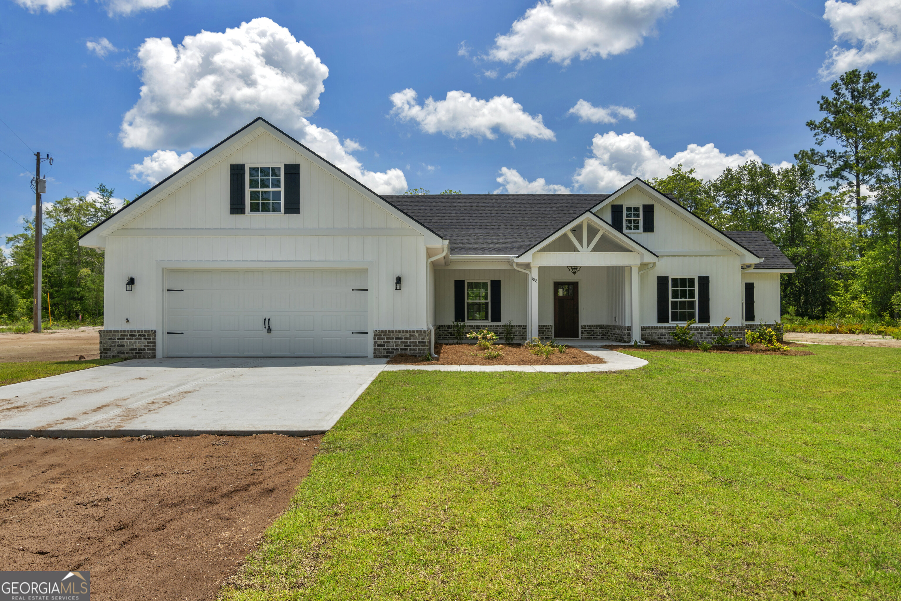 Back on market at no fault to seller. Welcome to your dream home on 2.25 acres in Long County! This stunning new construction offers 4 spacious bedrooms and 2.5 bathrooms, all nestled on a generous 2.25-acre cul-de-sac lot-perfect for privacy, outdoor living, or future expansion. This JM Allen Homes "Alayna 2" plan is move in ready and the builder is offering up to 10k towards closing costs or interest rate buy downs! Step inside to find an open-concept layout filled with natural light, modern finishes, and high-quality craftsmanship throughout. The kitchen features quartz countertops, custom cabinetry, stainless steel appliances, large island, and a separate pantry-ideal for both cooking and entertaining. The primary suite includes a large en-suite bath with double vanities, a soaker tub, large walk in shower, and walk in closet! Enjoy peaceful mornings on the covered front porch or host gatherings on the back patio overlooking your backyard. No HOA. The possibilities are endless-build a workshop, add a pool, or just soak in the wide-open views. Located just minutes from local amenities and schools, and a short commute to Fort Stewart or Brunswick! This home combines the tranquility of country living with everyday convenience. This one won't last long!