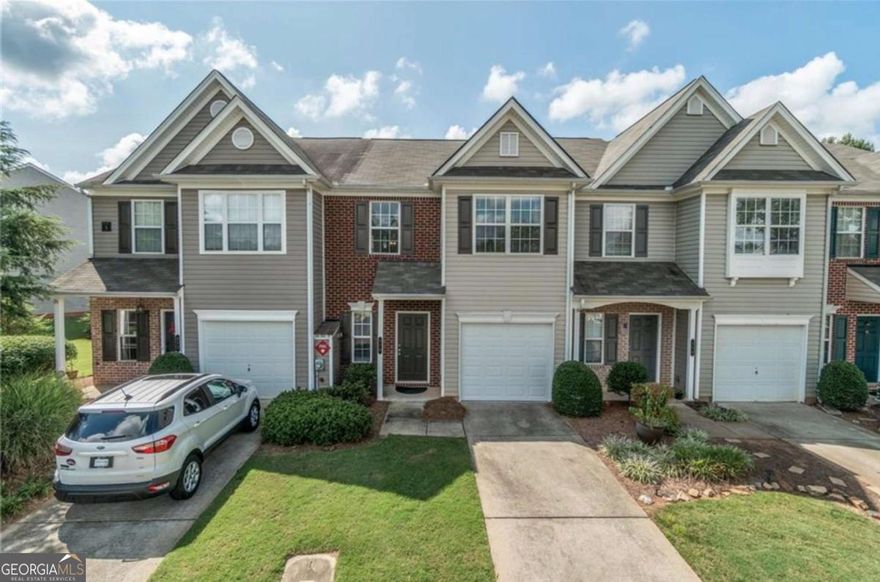Great townhouse and a fabulous location near EVERYTHING. Just off exit 14 on 400, close to Northside, Marketplace shopping and restaurants! Great open concept living plan with cozy fireplace and easy entertaining. Recently updated kitchen. Primary offers a lovely en suite bathroom with soaking tub and separate shower. The laundry room is upstairs for convenience. Great patio area out back for relaxing. This unit is one to see and can not be beat!Gated community with swimming pool, tennis courts, basketball court, dog park.