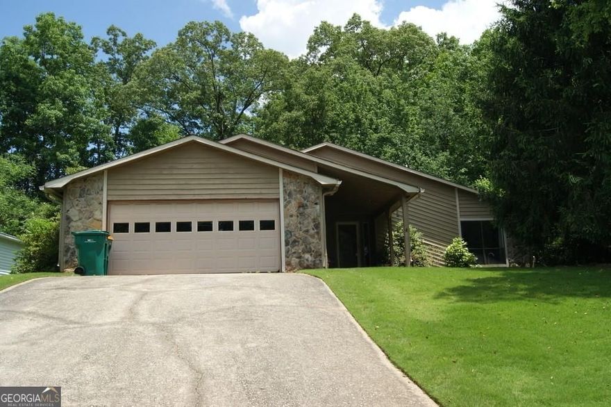 Sq. Ft. does not reflect tiled sunroom.  Incredible location with great schools.  One level living with tiled sunroom overlooking a private wooded backyard.  Vaulted living room with fireplace and ceiling fan; wet bar; separate dining room; 2 car garage; close to shopping, parks, schools and so much more!  Principal bedroom with private bath and large walk in closet; professionally managed property; landlord provides trash, yard maintenance and pest control with rent.  New double pane windows throughout for efficient living; no carpet in this home.