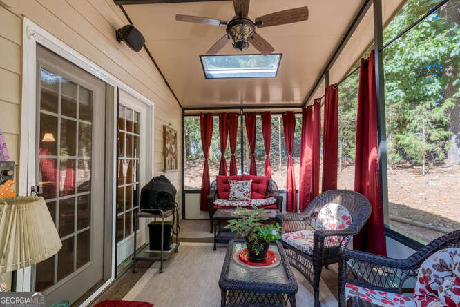 Welcome home to this 3 bedroom 2 bath ranch home completely rebuilt in 2011. Lush landscaping with established Japanese maples surround the home. Features include a vaulted family room with custom fireplace. Kitchen with granite countertops, stained cabinets and stainless steel appliances overlook the living area. Enjoy breakfast as you watch the birds through the bay window in the eat- in kitchen or entertain friends in the separate dining room. Primary bedroom includes walk-in closet with closet system for optimal organization. Primary bathroom features double vanity with solid surface countertops, soaking tub and tiled shower. 2 additional bedrooms are spacious and bright and share a well appointed tiled bathroom. Enjoy your morning coffee or a refreshing drink in the evening on the screened in patio. A shed at the side of the house provides additional storage for lawn equipment, while the garage includes shelves and cabinets for extra storage space. No need to purchase new appliances. Samsung Washer and dryer, refrigerator, microwave, dishwasher and Bosch gas range are already in place. Parkwood Commons has an HOA with optional recreation fee for the pool if you choose. Convenient to I-75, shopping and schools.