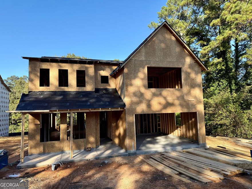 The Melissa Plan built by a Custom Builder. This beautifully crafted home will not disappoint! Designed with comfort, elegance, and functionality in mind, this Primary on Main floor plan greets you with elevated ceilings and rich details throughout. The separate dining room with coffered ceilings sets the stage for memorable gatherings, Stunning wood flooring flows seamlessly into the spacious family room, accented by exquisite trim work -perfect for hosting friends and family. At the heart of the home, the gourmet kitchen shines with an abundance of softclose cabinetry, gleaming quartz countertops, a generous island with bar seating, and stainless steel appliances including double ovens and a built-in microwave drawer. The Primary Suite, privately tucked away on the main level, boasts a trey ceiling and private access to the covered patio. Step into the luxurious ensuite featuring a tiled shower with glass enclosure, soaking garden tub, quartz countertop vanity, and a sizeable walk-in closet to keep everything organized. A tiled laundry room and powder bath add everyday convenience to the main level. Upstairs, a spacious loft area provides the perfect spot for homework, gaming, or a cozy lounge. Each secondary bedroom is complete with its own en-suite bathroom, offering comfort and privacy for everyone. This home truly has it all - style, space, and thoughtful design! Home will be ready January/February 2026.