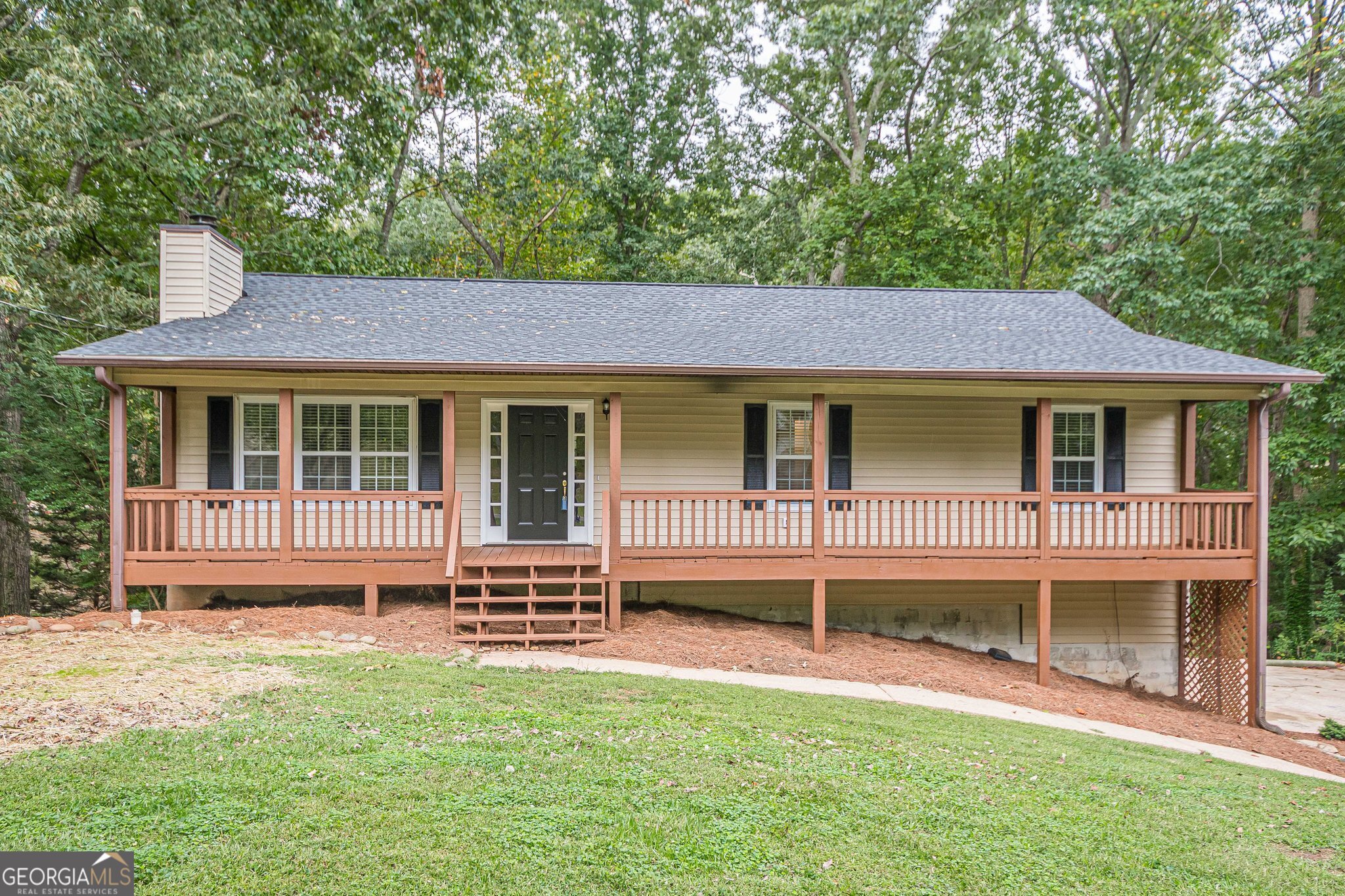 **NEW ROOF!** Must see ranch in Canton that's looking for new owners to call home! As soon as you step inside you are greeted by a covered rocking chair front porch. Inside a living room with stone fireplace greets you. Kitchen includes white cabinets, plenty of storage and an island! Private dining room off the kitchen leads to a four season sunroom. This lovely room has tons of natural light and overlooks the private backyard. Primary suite on the main has private bath with double vanities and tub/shower combo. Two more bedrooms make up the first floor and share a hall bath. Downstairs includes finished room with vinyl flooring. Two car drive under garage means parking and storage galore. NO HOA.