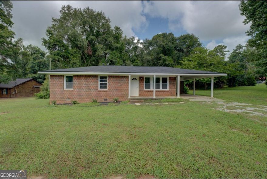 Welcome home to this beautifully remodeled 3-bedroom, 1-bath all-brick ranch, perfectly combining timeless charm with modern comfort. Situated on a spacious lot with no HOA.  You have ample space for gardening, raising pets, or simply enjoying the quiet beauty of country living. This home has seen major updates throughout, including all new plumbing, electrical, flooring, and roofing. The septic system was pumped just two years ago, and the gas furnace provides efficient warmth through the colder months. Inside, you'll love the luxury vinyl plank flooring that flows seamlessly through every room, adding both style and durability. The new roof and water heater mean you can move right in with peace of mind.Step outside and take in the serene setting the yard is perfect for gardening and entertaining. Whether you're dreaming of a backyard barbecue, a workshop project, or a little more elbow room, this property delivers space and flexibility.Conveniently located just minutes from shopping, dining, schools, and parks, yet far enough to enjoy the tranquility of country life. 882 Campbell Road offers the best of both worlds.