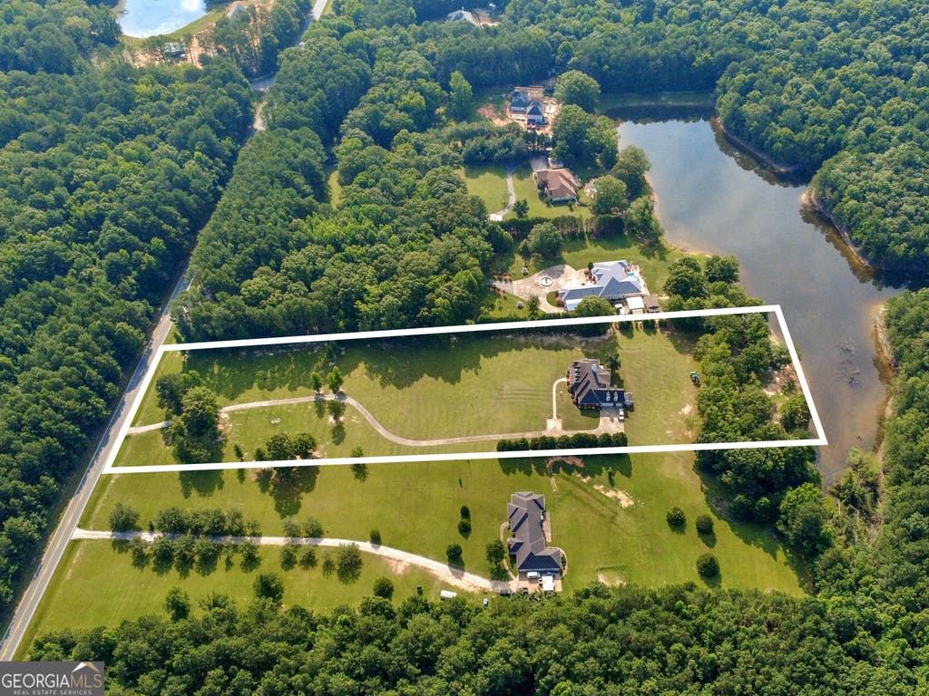 Photo of 395 W McIntosh Road, Brooks, GA 30205 (MLS # 10799809)