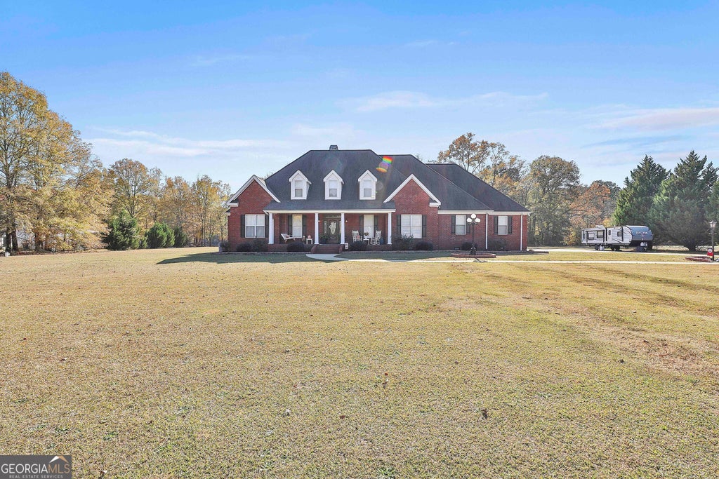 Photo of 395 W McIntosh Road, Brooks, GA 30205 (MLS # 10799809)
