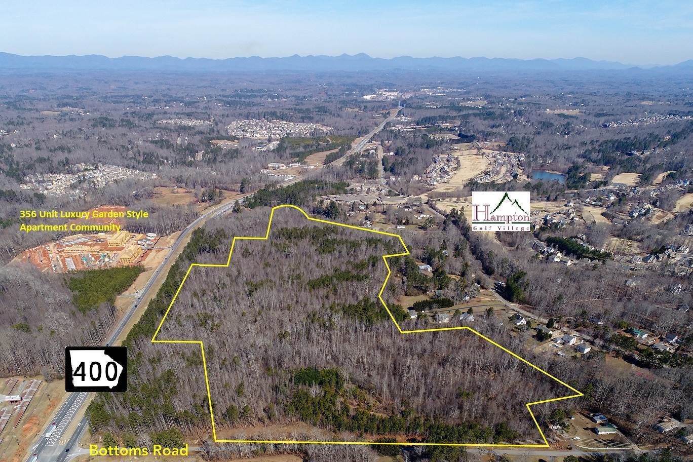 Property is offered at $110,000 ppa  1,082 feet of GA 400 frontage and 896 feet on Bottoms Road.  This property is very unique - only property in the vicinity zoned HB. Traffic Count of 35,000 (2017) 66+ acres is next to/near Hampton Golf Village which contains 462 homes ranging in price from $280,000 to $400,000.  There are 356 apartments units currently under construction directly across from this property on GA 400. 4.5 miles S of GA Premium Outlet Mall,  with over 6 million visitors a year Near new Kroger, Publix, Marshalls, Hobby  Lobby, adjacent to the Hampton Golf  Village  & across from new 356upscale garden-style apt. complex