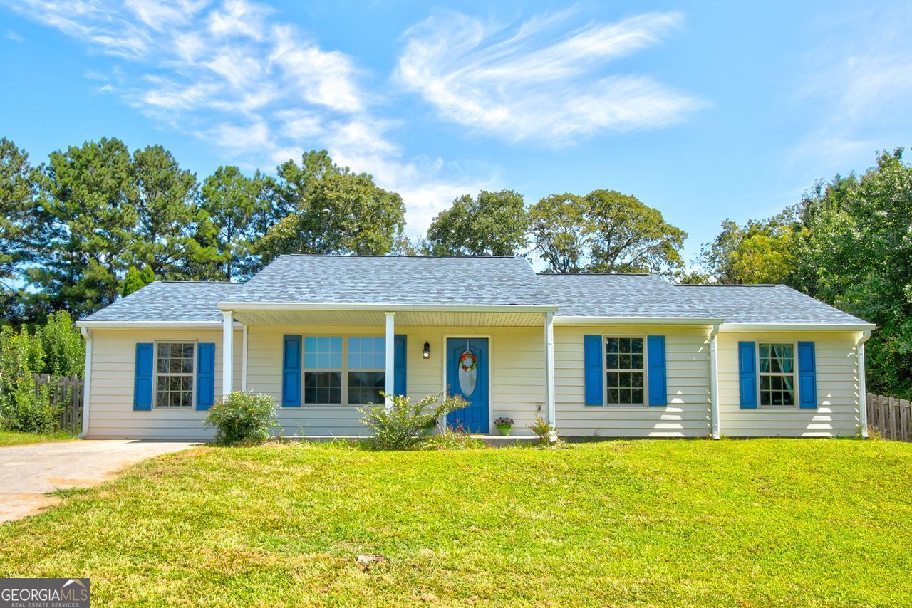 Adorable Ranch in a quiet neighborhood with no HOA. This cozy 3 bedroom, 2 bathroom home won't last long. Great first home, empty nest, or investment. Large front yard and back yard with plenty of room for family gatherings and barbecues. New Architectural Shingles Roof and new Gutters, recessed lighting in Living Room and Hall, ceiling fans in Den and all Bedrooms. Ceramic Tile in the Kitchen, Den, Dinning Room, Living Room and Hall. Carpet in the Bedrooms. Convenient to shopping and schools yet has an 'away from the fray' feel to the area which is surrounded by open pastures and fields. If you are looking for a cozy well kept ranch, this is a must see home!
