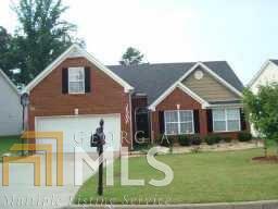 Great Floor Plan & Well Maintained FRONT BRICK Ranch in Established Neighborhood in Sought After COLLINS HILL CLUSTER. Open Floor Plan, Vaulted Ceilings, Oversized BEDROOM UPSTAIRS with FULL BATH. Spacious Master with BAY Window and Walk-in Closet. Master Bath Offers Double Vanity, Separate Shower and Garden Tub. Private, Level Fenced Yard. Convenient Location off of Collins Hill Rd, Minutes From HWY 316, GEORGIA GWINNETT COLLEGE, Lawrenceville-Suwanee Rd, Buford Dr and Much More!