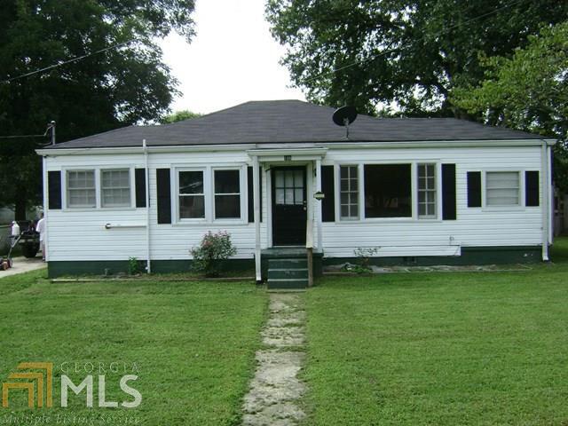 Motivated Seller!! 2BR/1BA home recently renovated, hardwood floors, pull down attic stairs, fenced back yard, outbuilding.