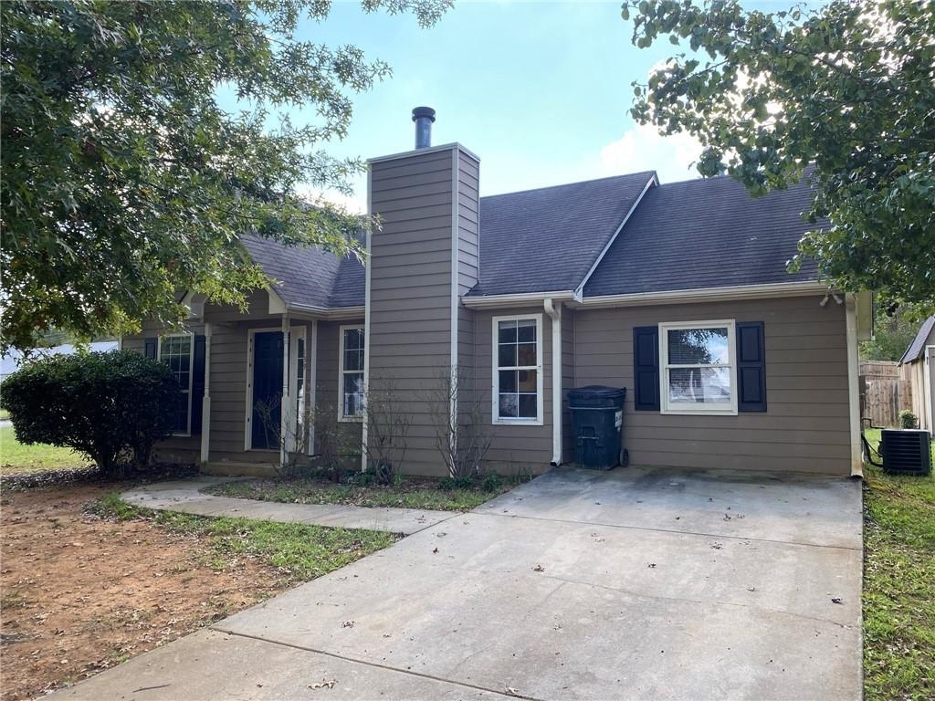 Stepless 3 bedroom ranch at a Great Price! Large level corner lot with a large outbuilding for storage or a workshop. AC is less than 2 years old.