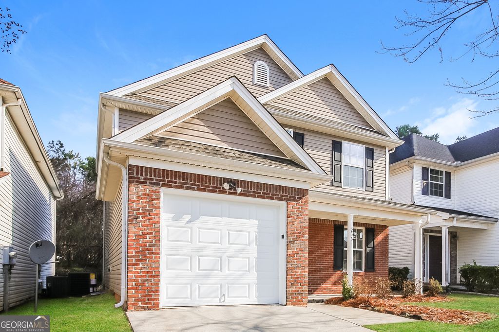 Photo of 11236 James Madison Drive, Hampton, GA 30228 (MLS # 10671702)