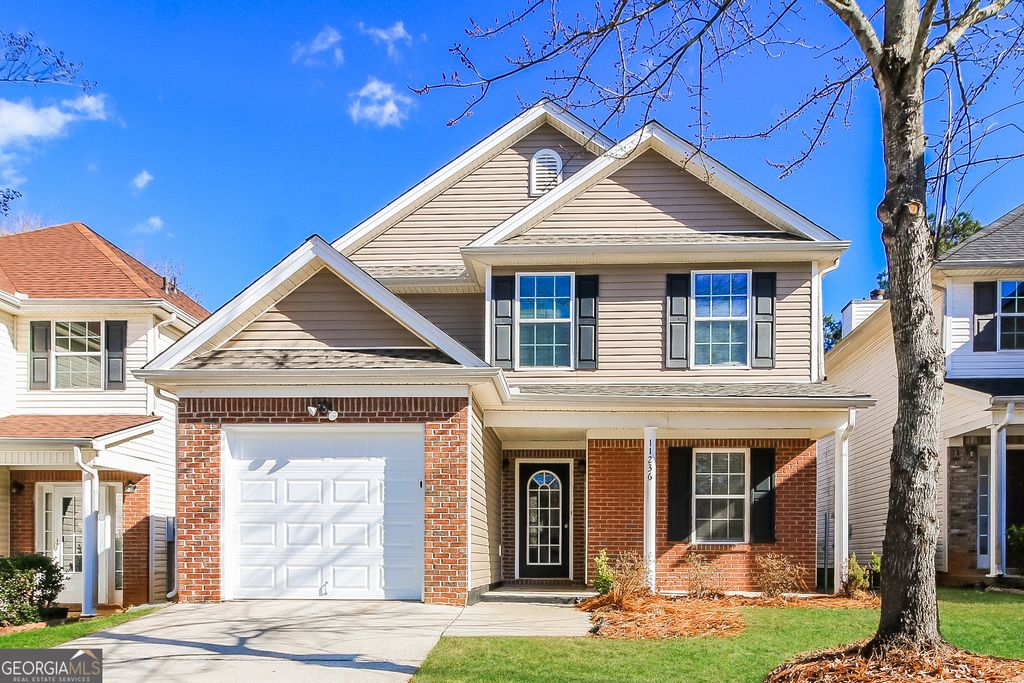 Photo of 11236 James Madison Drive, Hampton, GA 30228 (MLS # 10671702)