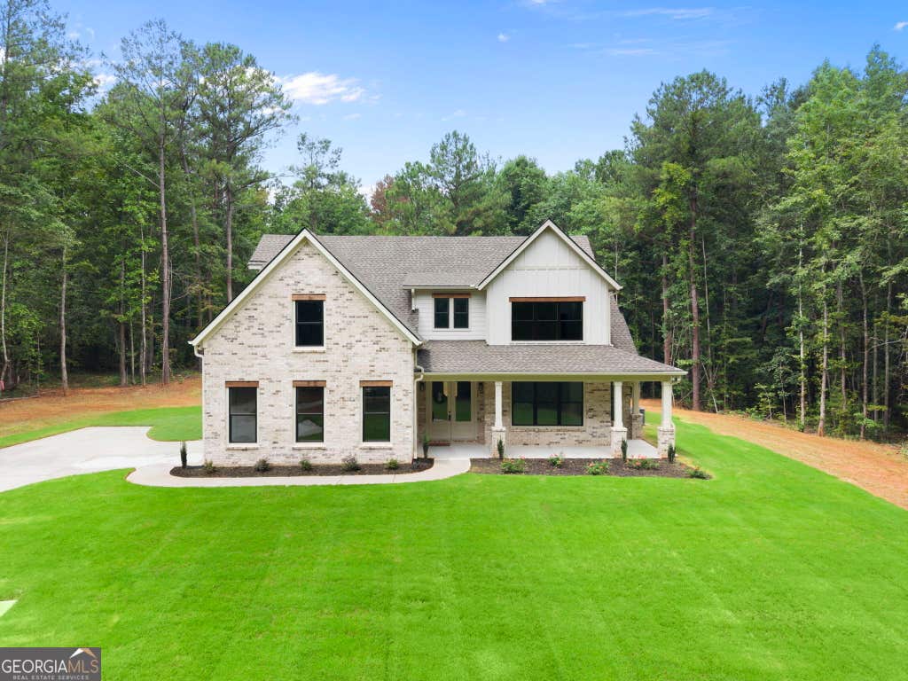 Photo of 125 Maple Valley Dr, Jenkinsburg, GA 30234 (MLS # 10815139)
