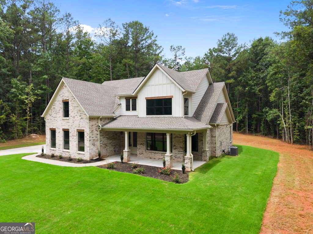Photo of 125 Maple Valley Dr, Jenkinsburg, GA 30234 (MLS # 10815139)
