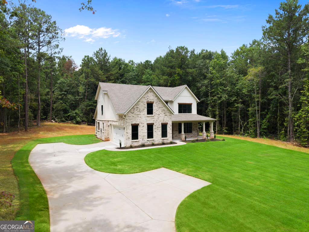 Photo of 125 Maple Valley Dr, Jenkinsburg, GA 30234 (MLS # 10815139)