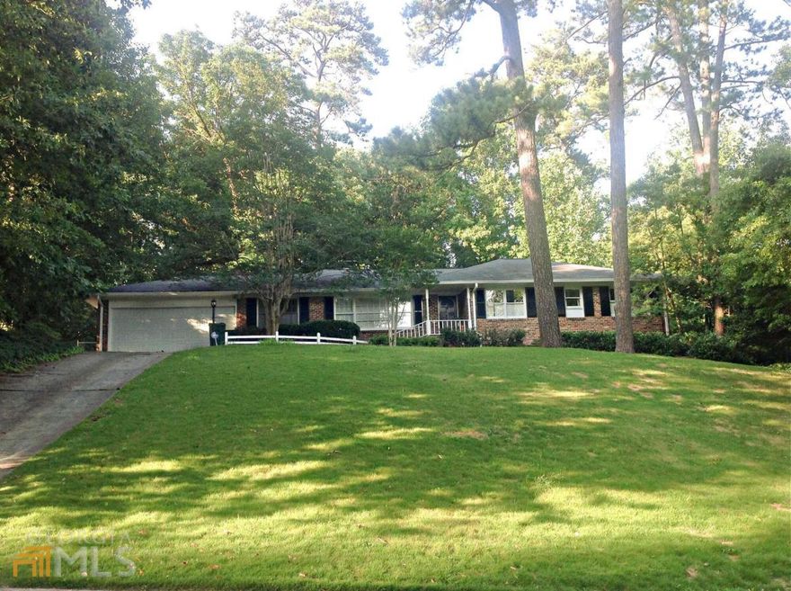 Best of the old/new on one-half acre! Owners added onto home with amazing renovations. Huge, impressive great-room has perfectly placed dramatic window with view of rare private/wooded backyard. Owners worked hard to keep vintage character- rustic hardwoods/original masonry fireplace, numerous custom built-ins. Master w/attach bath. Kitchen/ baths renovated. Fully finished basement with rec room, three addCOl rooms PLUS unbelievable amt storage. Fenced yard. Patio plus deck.
