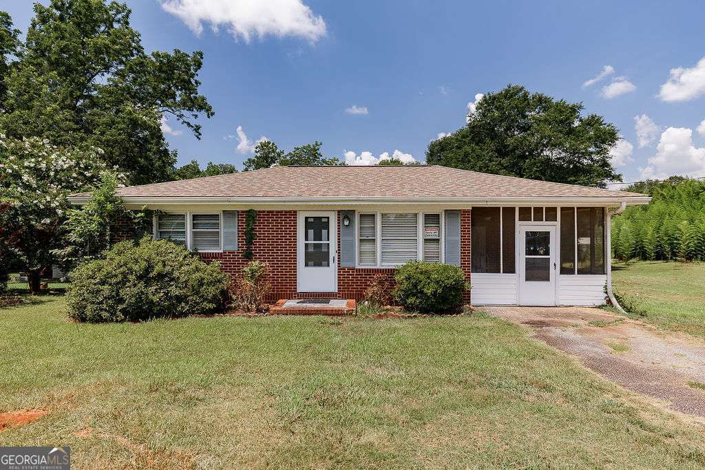 Classic Brick Home in Oconee with Additional Buildable Lot! Great location on Simonton Bridge Rd offers quick access to both Downtown Watkinsville and Athens! Close to Shopping, Dining, Parks, UGA, UNG & More! 1 Mile to 100ac Thomas Farm Preserve, 2 Miles to downtown Watkinsville & WirePark, 3 Miles to Botanical Gardens, 4 Miles to UGA Campus. The home features open concept living area and 2 Bedrooms, 1 Bathroom. Hardwood & tile flooring. Carport was enclosed as screened patio, but could easily be converted back to a carport or fully enclosed as additional living space. Don't miss this great opportunity in Oconee County for a brick home in great area for just under $300k! Also for sale is an adjacent lot, appx 1/2 acre with soil test already complete and suitable for conventional septic system for a new home! Buy both together for $400k for a great investment in one of the best counties in the state! Make you're appointment to view this great property today!