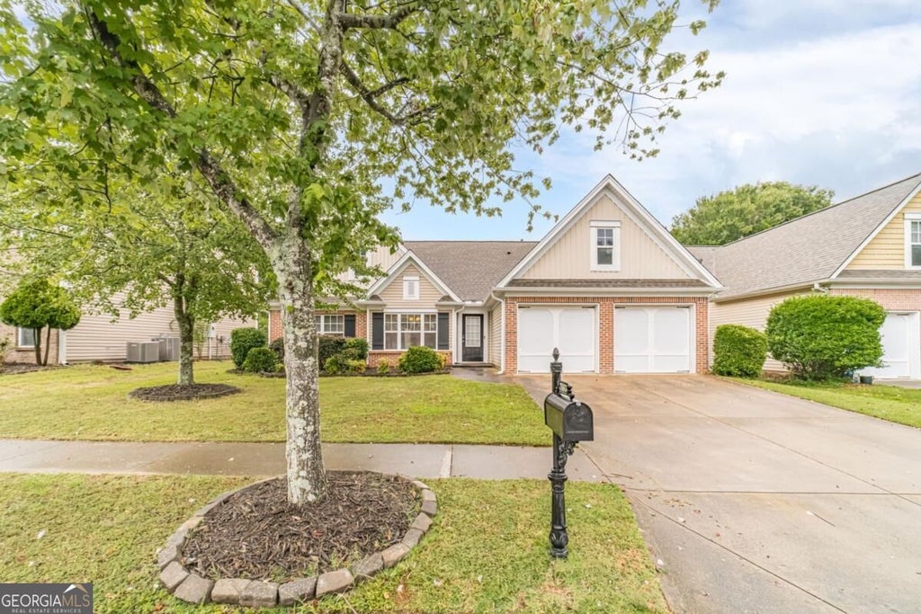 Photo of 2463 Walnut Tree Lane, Buford, GA 30519 (MLS # 10854694)