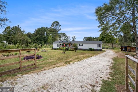 Photo of 437 England Chapel Road, Jenkinsburg, GA 30234 (MLS # 10691897)