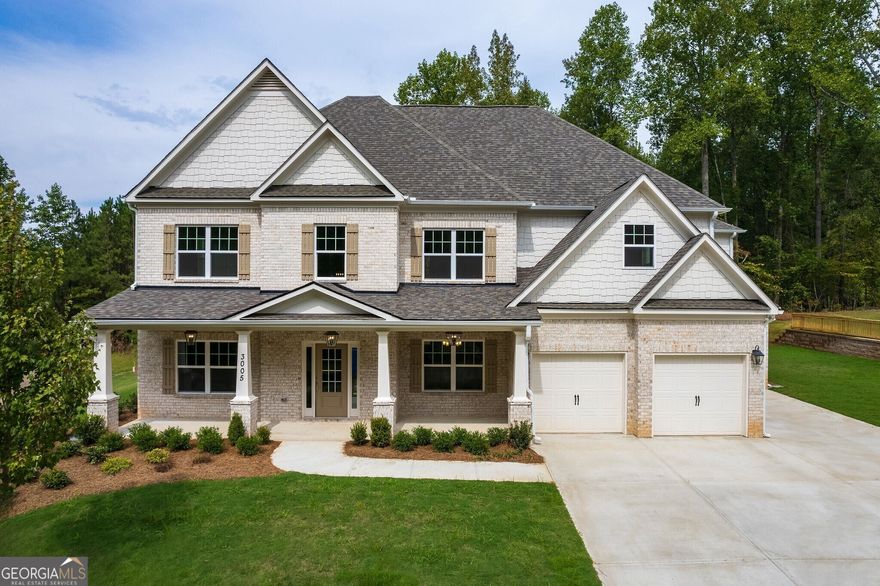 The Jamestown plan built by Heatherland Homes. This captivating 4-sided brick residence exudes a timeless charm that is simply unparalleled. Boasting five generously proportioned bedrooms and four full baths; this home offers an abundance of space for both relaxation and entertainment. Step inside and be greeted by the warm embrace of the formal living and dining rooms, where cherished moments with loved ones are sure to unfold. The great room, adorned with intricate Coffered Ceilings, invites you to unwind by a cozy fireplace, providing the perfect backdrop for intimate gatherings. Prepare to be swept away by the gourmet kitchen. Quartz countertops and a spacious island set the stage for culinary creativity, while the adjacent keeping room with fireplace that beckons for cherished family dinners. Immerse yourself in a world of entertainment and relaxation with the dedicated media room, all within the comforts of your own home. Retreat to the sprawling Primary room, a haven of tranquility boasting a delightful sitting area. With ample space to unwind, this private sanctuary promises a true escape from the demands of the day. Practicality meets luxury with a 3-car garage, ensuring ample space for all your vehicles and storage needs. Meanwhile, a covered patio offers a serene outdoor oasis, perfect for savoring moments of peace and relaxation. Situated on a coveted corner lot, this property not only provides added private back yard but also showcases its distinctive presence in the community. Hardwood flooring throughout the main level adds an extra touch of sophistication, seamlessly complementing the home's impeccable design. Indulge in the array of community amenities, including swimming, tennis, playgrounds, and a serene lake. Quick Move-In