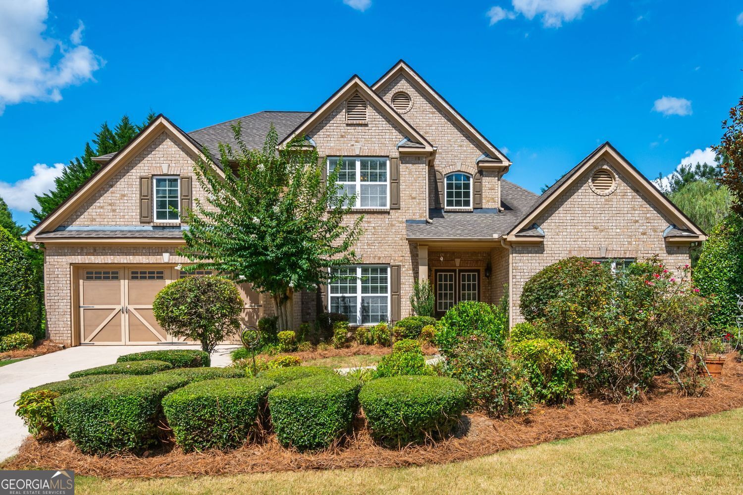 Formal Model home w Master On Main, Formal Living Rm / Office features custom Built-ins, Separate Dining Rm, 2-Story Family Rm w Built-ins & Double Sided Fireplace, Open Kitchen w Island, plenty of Counter Space / Cabinets, Breakfast Area, Large Walk in Pantry. Stunning Back yard w enhanced landscaping, No neighbor on the Right side of home, walk to Pool / Tennis / Community Firepit. 2nd Floor has 3 Br's w Walk in Closets, 2-Full Baths, Built-in Work station. You are close to GA-400, Lake Lanier, Northside Forsyth Hospital, HD, Lowes, Costco, a ton of restaurants, Target, Walmart, Multiple Parks (bike trails, Walking trails paths, Dog Parks, Covered Playgrounds all 15m or less away). Yes Easy access to everything you could possibly need. No HOA Rental Restrictions