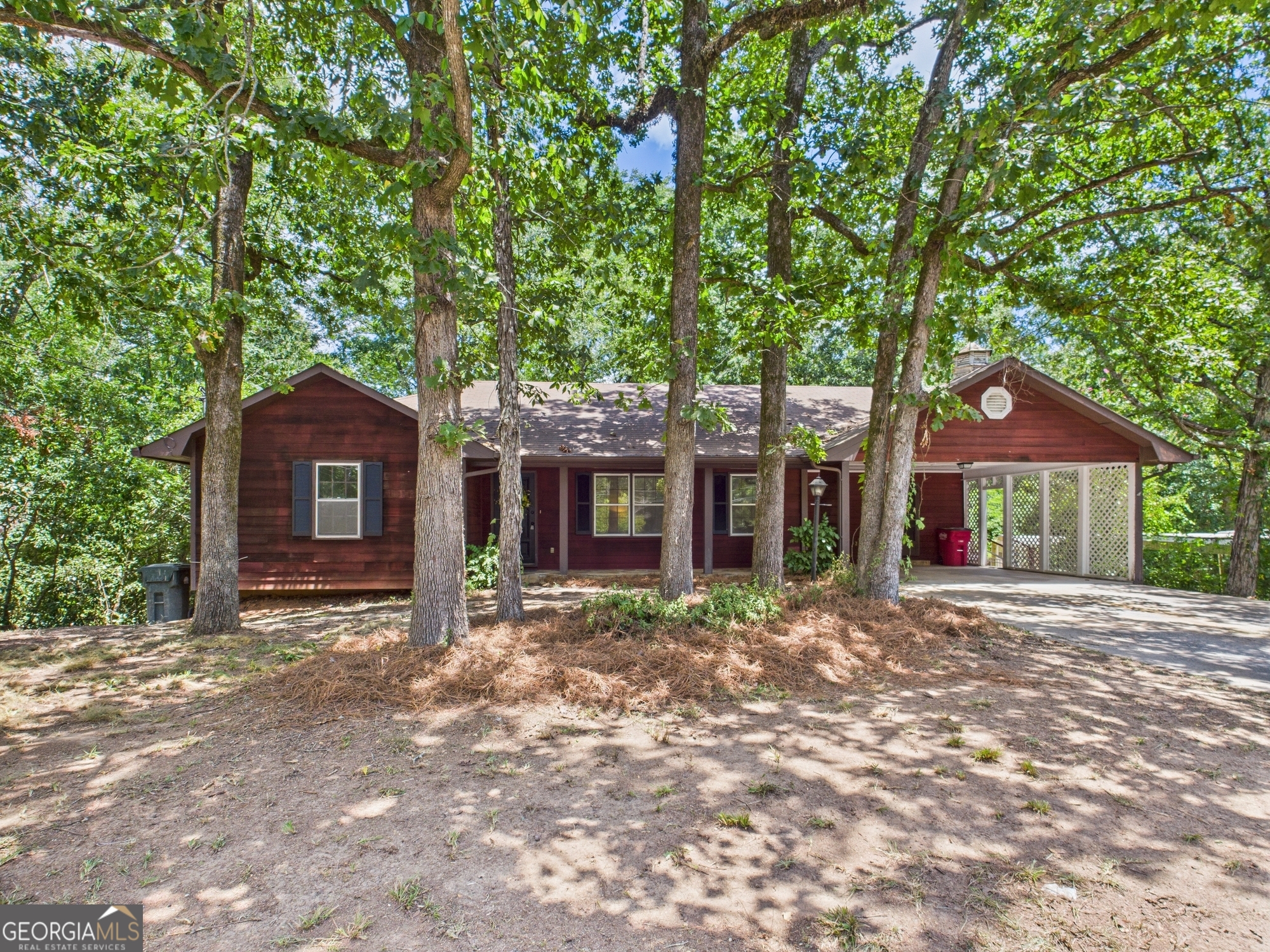 Located in the desirable Lake Wildwood subdivision, this spacious 4-bedroom, 2-bathroom home offers the perfect blend of comfort, character, and community living. Nestled in a quiet neighborhood, this home is full of charm and thoughtfully designed spaces. Step inside to a welcoming living area that flows seamlessly into the dining space and open kitchen, which features stainless steel appliances and plenty of room for cooking and gathering. Just beyond, enjoy an additional living space centered around a cozy fireplace-perfect for relaxing evenings. Off the kitchen, a spacious laundry room includes extra storage and a second refrigerator. On the main floor, you'll find three generously sized bedrooms and two full bathrooms. The large master suite includes a walk-in tiled shower for a spa-like feel. Downstairs, a bonus living room and bedroom offers endless possibilities-ideal for a home office, playroom, gym, or guest suite. Enjoy outdoor living on the front porch or unwind on the screened-in back porch overlooking your private, wooded backyard. The carport adds covered parking and convenience. As part of the Lake Wildwood community, you'll also enjoy access to fantastic amenities including a community pool, putt-putt course, playground, and more. Don't miss this opportunity to own a beautifully maintained home with space, privacy, and access to resort-style amenities. Schedule your private tour today!