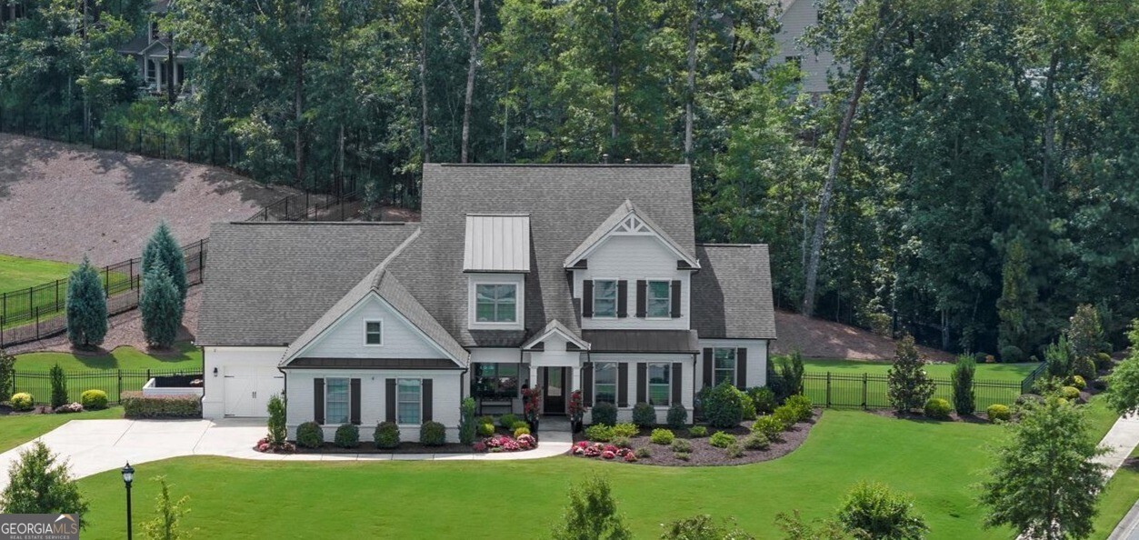 IF YOU EVER WANTED TO LIVE IN AN ELEGANT MODEL HOME W/BEAUTIFUL QUALITY CRAFTSMANSHIP-THIS IS YOUR CHANCE! SO MANY WONDERFUL UPGRADES IN THIS IMPECCABLY MAINTAINED HOME W/BEAUTIFULLY LANDSCAPED YARD/A PRIVATE MANICURED FENCED BACKYARD W/FABULOUS SCREENED PORCH INCL. EXTRA SHADED SCREEN TOO/THIS HOME HAS AN AMAZING FLOOR PLAN- NATURAL LIGHT IS ABUNDANT/ADDED PLUS IS ALL L.E.D.LIGHTING & ADDED RECESSED LIGHTING/SO MANY TRAY CEILING DETAILS/5 INCH PRE-ENGINEERED OAK FLOORING THROUGHOUT/SO EASY TO ENTERTAIN W/ELEGANT DINING RM W/PANELED WAINSCOT DETAILS/LOTS OF FAMILY AND FRIENDS ENJOYMENT CAN BE IN THE LARGE OPEN FIRESIDE GREAT ROOM OPENING TO THE FABULOUS EXTENDED SIZE KITCHEN W/ADDED CABINETRY-DOUBLE OVENS/5 BURNER GAS COOKTOP W/STAINLESS STEEL HOODED VENT/BUILT IN MICROWAVE/FRENCH DOORS REFRIGERATOR/SOPHISTICATED GRANITE COUNTER TOPS/LARGE SINK IN THE OVER SIZED GRANITE ISLAND W/SEATING AT BAR--THERE IS ENOUGH ROOM FOR CASUAL DINING ADJACENT TO ISLAND BUT IF YOU WANT ANOTHER SITTING AREA INSTEAD- THE STACKED STONE FIRESIDE KEEPING RM IS A GREAT ADDITION! SCREEN PORCH IS ADJACENT FOR YOUR MORNING COFFEE ENJOYMENT/LARGE WALK IN PANTRY/BEADBOARD DETAILED CABINETS IN MUDROOM/GUEST BEDROOM SUITE WITH FULL BATH IS CONVENIENTLY LOCATED ADJACENT TO KITCHEN AREA/LARGE OWNER'S SUITE W/TRAY CEILING/RECESSED LIGHTING/SITTING AREA/ELEGANT SPA BATH W/OVER SIZED SHOWER/SOAKING TUB/LARGE SEPARATE VANITIES/CUSTOM BUILT HUGE HIS AND HERS CLOSET/WONDERFULLY SIZED STUDY ON MAIN FLOOR W/CLOSET/THE LAUNDRY RM/SINK W/ STORAGE CLOSET IS ADJACENT TO OWNER'S SUITE WHICH IS SO CONVENIENT/POWDER ROOM BY GREAT RM/IMPRESSIVE WROUGHT IRON RAILING ALL WOOD OVER SIZED TREAD OPEN STAIRCASE LEADS YOU TO A WONDERFUL RETREAT OR ENTERTAINMENT AREA & 3 BEDROOMS TOO! THERE IS PLENTY OF STORAGE IN THIS HOME AS WELL AS IN THE EPOXY SEALED FLOOR 3 CAR EXTENDED SIZE GARAGE/LARGE PARKING PAD ADJACENT/WONDERFUL CUL-DE-SAC STREET W/LARGER SIZED LOTS/GOVERNORS TOWNE CLUB IS THE ONLY 24/7 MANNED GATED COUNTRY CLUB COMMUNITY IN ALL COBB/PAULDING COUNTIES/THE LIKE NEW HUGE CLUBHOUSE HAS WONDERFUL DINING AND SPORTS BAR FACILITIES/LARGE EVENT AREAS FOR WEDDINGS OR PARTIES/GREAT SOCIAL EVENTS INCLUDING A WINE CLUB/GOLF LOCKER ROOMS/AN 18 HOLE CURTIS STRANGE DESIGNED CHAMPIONSHIP GOLF COURSE W/MOUNTAIN VISTA VIEWS/FOUNTAINS & PRIVATE LAKES/8 LIGHTED TENNIS COURTS & PICKLE BALL COURTS/TENNIS PAVILION FOR VIEWING/SECOND PRIVATE CLUBHOUSE FACING THE OLYMPIC SIZE POOL W/RECENTLY COMPLETED TIKI BAR FOR FUN WHILE SWIMMING/CHILDREN'S POOL & WATER SLIDES/CHILDREN'S PLAYGROUND AREA/BASKETBALL COURTS/SOFTBALL FIELD/WONDERFUL EUROPEAN SPA FACILITY & OVER SIZED EXERCISE FACILITY/WALKING TRAILS & SIDEWALKS/SO MUCH FUN TO ENJOY HERE IT IS LIKE BEING ON VACATION WHILE NEVER LEAVING HOME! CLOSE TO SHOPPING/RESTAURANTS/HIGHWAYS/LAKE ALLATOONA IS ONLY 15 MINUTES AWAY FOR BOATING/COBB COUNTY MCCULLUM AIRPORT IS ONLY 25 MINUTES AWAY TOO! THERE IS A MANDATORY $30,000 ATHLETIC MEMBERSHIP INITIATION FEE DUE AT CLOSING FOR THE COUNTRY CLUB MEMBERSHIP.