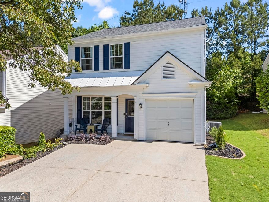 Welcome to this beautifully updated 3-bedroom, 2.5-bathroom home located just minutes from the vibrant shops, dining, and entertainment of Downtown Alpharetta and Avalon. Thoughtfully renovated, this home features an open floor plan filled with natural light, perfect for modern living. The kitchen boasts elegant quartz countertops, updated finishes, and flows seamlessly into the dining and living areas. A cozy gas fireplace adds warmth and charm to the intimate living room, making it the ideal spot to relax. Upstairs, the spacious primary suite includes a walk-in closet and a private en-suite bath. Two additional bedrooms share a full bathroom, perfect for guests, family, or a home office setup. Step outside from the kitchen to a private rear patio, perfect for grilling or enjoying your morning coffee. HVAC (2 years old), Roof (2 years old), and Hot Water Heater (4 years old).