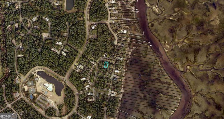 Beautiful building lot in Cumberland Harbour, A gated community with spectacular views of the Intracoastal Waterway and the Cumberland Sound. Located in Historic St Marys, minutes from to Jacksonville FL Int'l Airport and Jacksonville shops and well-known medical facilities. Subdivision amenities include hard thru tennis courts, 3 swimming pools, a poolside pavilion with a fireplace for cozy cool night gatherings, a Spring House with a fully equipped kitchen and open bar for large gatherings, 2 pickleball fields, a basketball court, multiple playgrounds, a day dock with kayak launch and nature trails. Schedule a private tour of this lovely community. A licensed Agent must accompany to enter the gate.