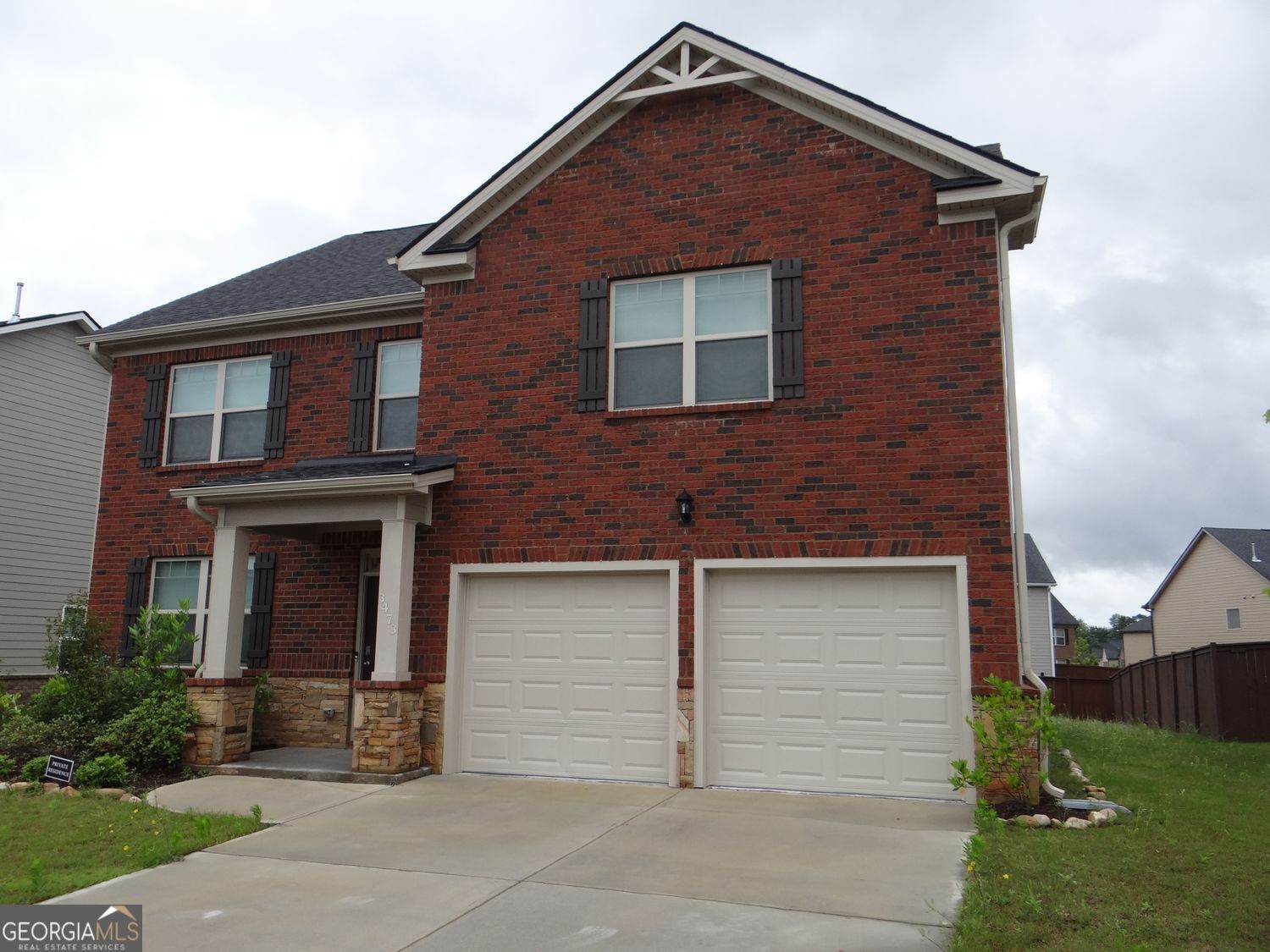 If you need extra living and storage space this home has it. A total of 5 bedrooms including 1 bedroom and a full private entry bath adjoining the bedroom. There is a separate half bath on the main level for guests. The upper level includes 4 bedrooms including an oversized main bedroom with a sitting area, walk in closets and spa style bath with dual vanities, separate tub and shower and a private toilet. The main bedroom also features a walk in closet with a secured entrance to the laundry area. The upper level also includes 3 additional bedrooms and a shared bathroom with dual vanities. All of the bedrooms feature lighted and ventilated closets. The kitchen features solid surface countertops,Gas Range,/ Oven, Stainless Steel Microwave, Refridgerator and Dishwasher. The kitchen also features an open view to the family room and the dining area. The Independence community features resort style amenities, including 2 pools, tennis courts, sports field, cabanas, pond, fire-pit, grilling stations, outdoor fireplace, massive park and walking trails. The neighborhood also connects to Bay Creek Park for additional amenities. This is not an all inclusive list of features and amenities, better to see in person.