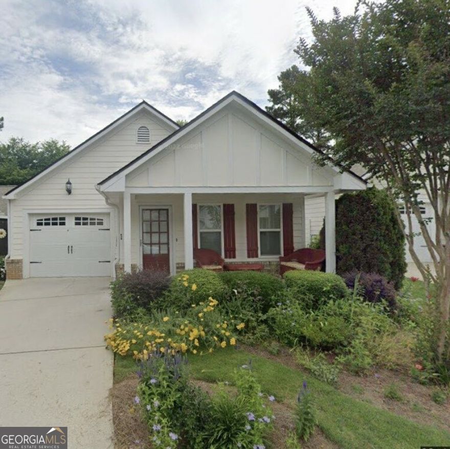 Charming cottage/ranch style home in sought after River Green, Pinnacle section! Freshly painted interior, NEW carpet, NEW LVP flooring in great room, kitchen, dining room & hallway to bedrooms. Oversized primary bedroom features double door to fenced patio area! Large sitting room/office in the primary bedroom plus a huge walk-in closet! Enjoy morning coffee on your private fenced patio/courtyard. Open great room features a fireplace with gas logs & NEW LVP flooring. Spacious kitchen features a breakfast bar, pantry, gas range, NEW LVP flooring & corrian countertops. Oversized dining room overlooks the private patio/courtyard area.  Washer/dryer/refrigerator included! Rocking chair front porch! Fabulous amenities: 2 clubhouses, 4 pools (1 with waterslide), tennis, pickleball & basketball courts.  Many neighborhood activities at the clubhouses. Sidewalks, street lights & underground utilities.  Lowest price in the subdivision for a house in this popular section of River Green.  Hurry, this section sells quickly.  Monthly fee covers lawn maintenance.