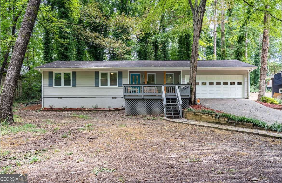 Discover this beautifully renovated 3-bedroom, 2-bath ranch at 111 John Christopher Drive in Alpharetta. Featuring oak hardwood floors, a sleek white kitchen with quartz countertops and stainless-steel appliances, plus stylish tiled bathrooms, this home blends charm and modern comfort. Enjoy the large gated front porch, backyard patio, and a streamside firepit on a private, oversized lot. Updates include new attic insulation, a tankless water heater, Nest thermostat, and remote control ceiling fans. Located near top schools and close to downtown Alpharetta, Avalon, and GA 400, this home offers convenience and quality living.