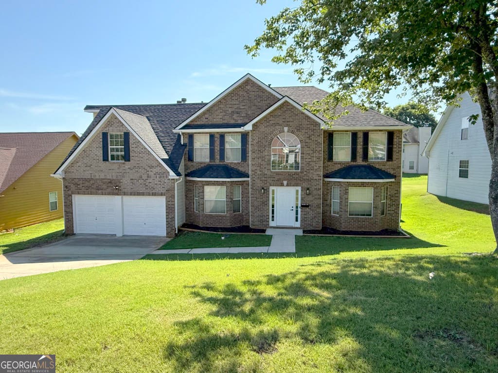 Photo of 9510 Creekside Road, Jonesboro, GA 30236 (MLS # 10810190)