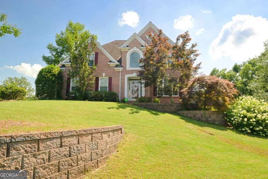 Step into this beautifully maintained, spacious home in the heart of East Cobb-one of the area's most desirable locations. With generously sized bedrooms, walk-in closets, and brand-new carpet throughout (installed in 2025), this home blends everyday comfort with timeless appeal.    Modern upgrades include a tankless water heater, whole house dichlorination and purification system, and a central vacuum for added convenience. Professionally designed outdoor lighting adds both charm and security.    Additional features include a rare three-car garage, a fully finished basement with endless possibilities, and a laundry chute from the primary closet for added ease. Located in a top-rated school district, this exceptional home offers the ideal combination of location, lifestyle, and lasting value.    **Seller is replacing 10 windows throughout the home! A $10,000 value!!**