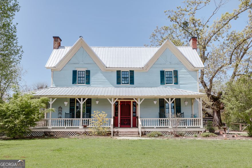 We just LOVE this renovated Victorian, urban farm. Minutes from downtown, shopping, UGA, and Watkinsville, the location is ideal for someone who wants to enjoy the charm and allure of country living while also participating in all the conveniences of being super close to town. Built in 1830, it's been lovingly updated to perfection. The openness of the farmhouse kitchen, coupled with the wide windows, original wood floors, and period accents create an effect that is both functional and fun. The property itself is amazing. At just under 2 acres, it's got everything-and I mean everything-that one could want. Raised beds with irrigation, a potting shed, fire pit, cook house, lights and an arbor. I could go on and on, but let's not fail to mention the epic barn with super cool wood remnants just waiting for someone to bring it back to its former glory. And don't forget the stunning pool: salt water, heated with an auto-fill option, it's surrounded with stunning rock accents and bluestone decking. There is an 8' Baja shelf and bench in the deep end. Flanked on one side by the fire pit and on the other side by the "cook house", it's the heart and sole of the backyard. The "cook house" is made with reclaimed planks from the old barn on the property. While we are on the yard, the back porch has epic sunset views over the pasture, and not to be outdone, the full front porch does likewise for sunrises (I mean, why not have both). A 500 gallon propane tank heats the pool and grill shack. New plumbing, upstairs HVAC, electrical in 2017. Roof is metal (no idea as to age). Everything about this house is charming, pleasing and hypnotic. With plenty of room to roam, it's ideal for someone who wants the best of both worlds: in-town convenience and country character. This one of a kind property will certainly cast a spell on all who walk through the doors.