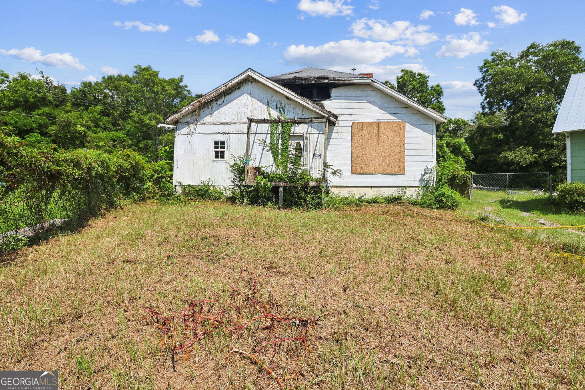 Opportunity for a savvy investor or builder in Macon's 31204 zip! This 2-bed, 1-bath home built in 1933 that suffered fire damage. The structure will require full gut renovation. Lot is ~0.29 acres with utilities available. At land value pricing, this deal gives you instant equity potential whether you clear and rebuild or salvage and renovate.