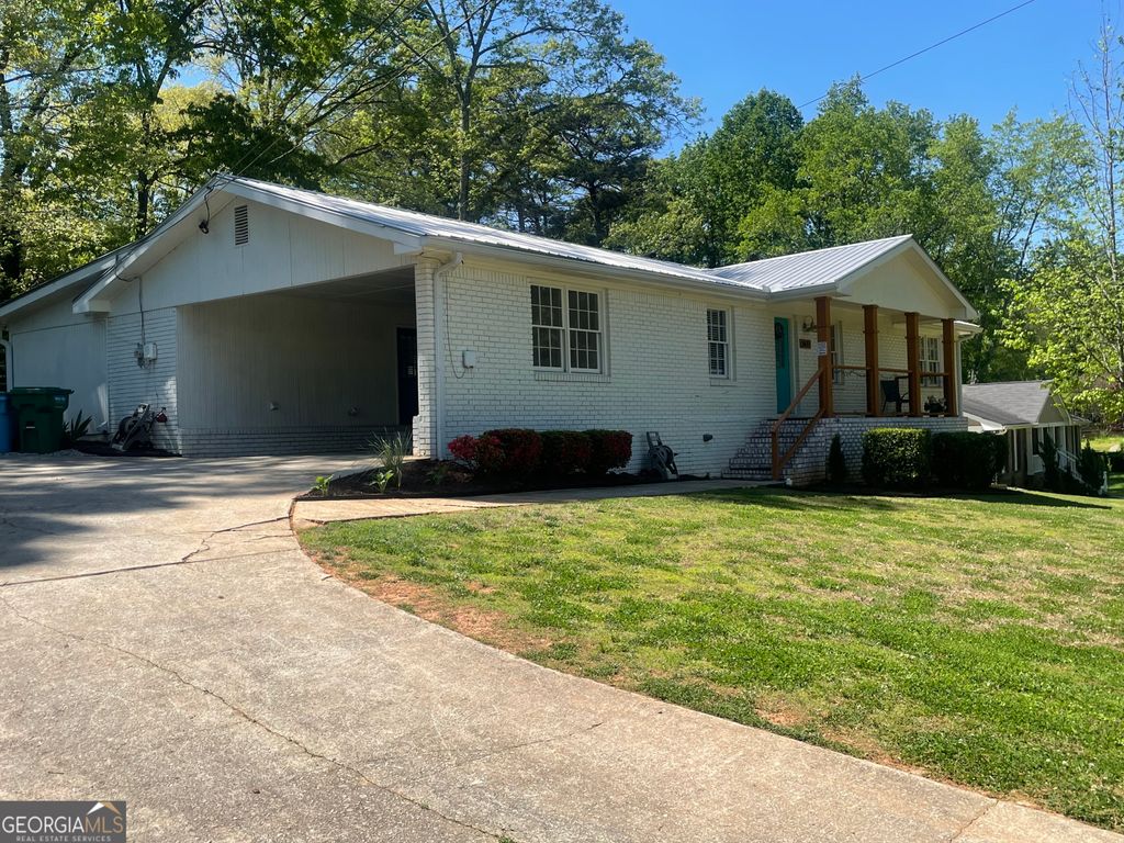 Photo of 1611 Carlton Avenue, Stone Mountain, GA 30087 (MLS # 10740968)