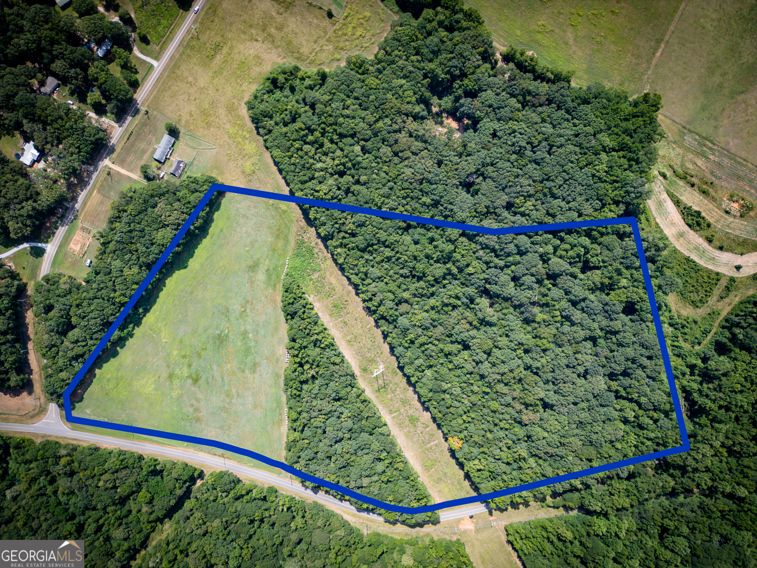 Whether you're looking to build your dream home, start a hobby farm, or invest in a versatile piece of land, this 27 acre property delivers. Located in a peaceful rural setting with convenient access to nearby highways and amenities, this lot provides the best of both worlds: mature trees for shade and seclusion, plus open, level ground ideal for building, grazing, or gardening. There is a GA Power Easement.