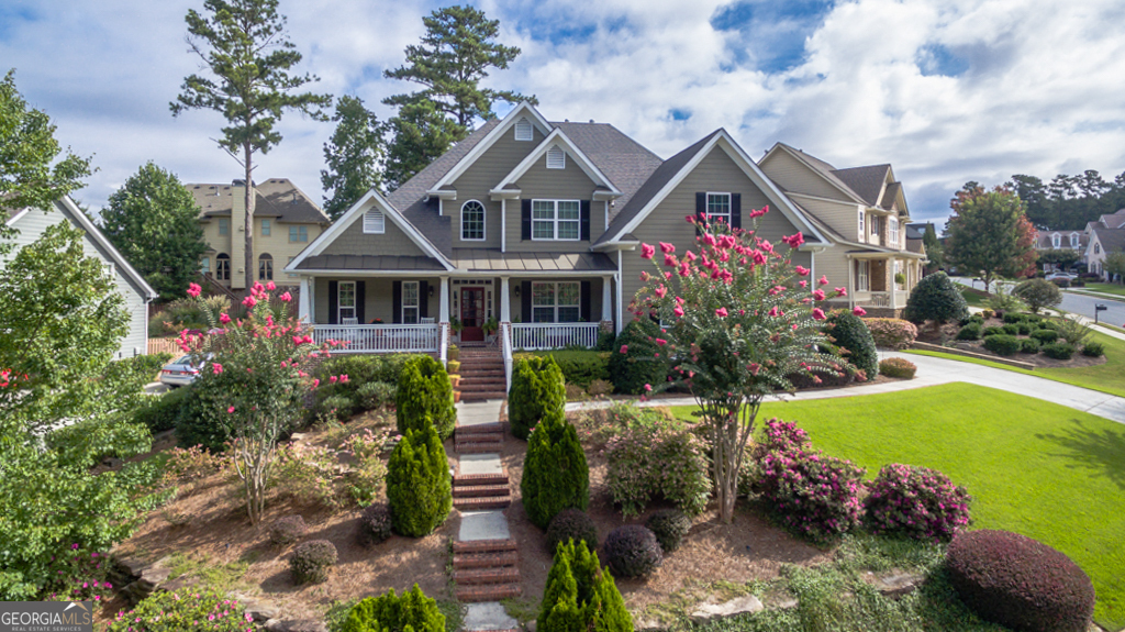 Welcome to 1060 Windsor Creek Drive in Grayson, GA - a spacious and well-appointed home offering 5 bedrooms, 3 full and 2 half bathrooms in a highly sought-after swim and tennis community. The main floor features a luxurious master suite with an upgraded bath including dual vanities and a walk in shower. Along with a chef's kitchen boasting an eat-at island, the main floor includes a breakfast room, keeping room, formal dining room, great room, and two cozy fireplaces. Upstairs you'll find three additional bedrooms and two full baths, providing ample space for family or guests. Enjoy outdoor living on the screened-in back porch overlooking a fenced backyard. The partially finished basement includes a bedroom, office, and half bath, with plenty of storage in the unfinished area. Neighborhood amenities include a clubhouse, pool, tennis courts, playground, sidewalks, and street lights, all conveniently located near shopping, dining, parks, schools, and the library. Come make this your next home.