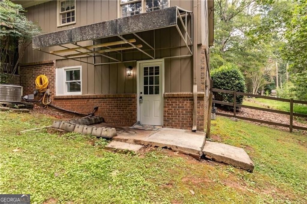 Photo of 4932 Rock Haven Drive SW, Lilburn, GA 30047 (MLS # 10636665)