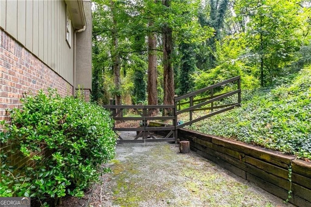 Photo of 4932 Rock Haven Drive SW, Lilburn, GA 30047 (MLS # 10636665)